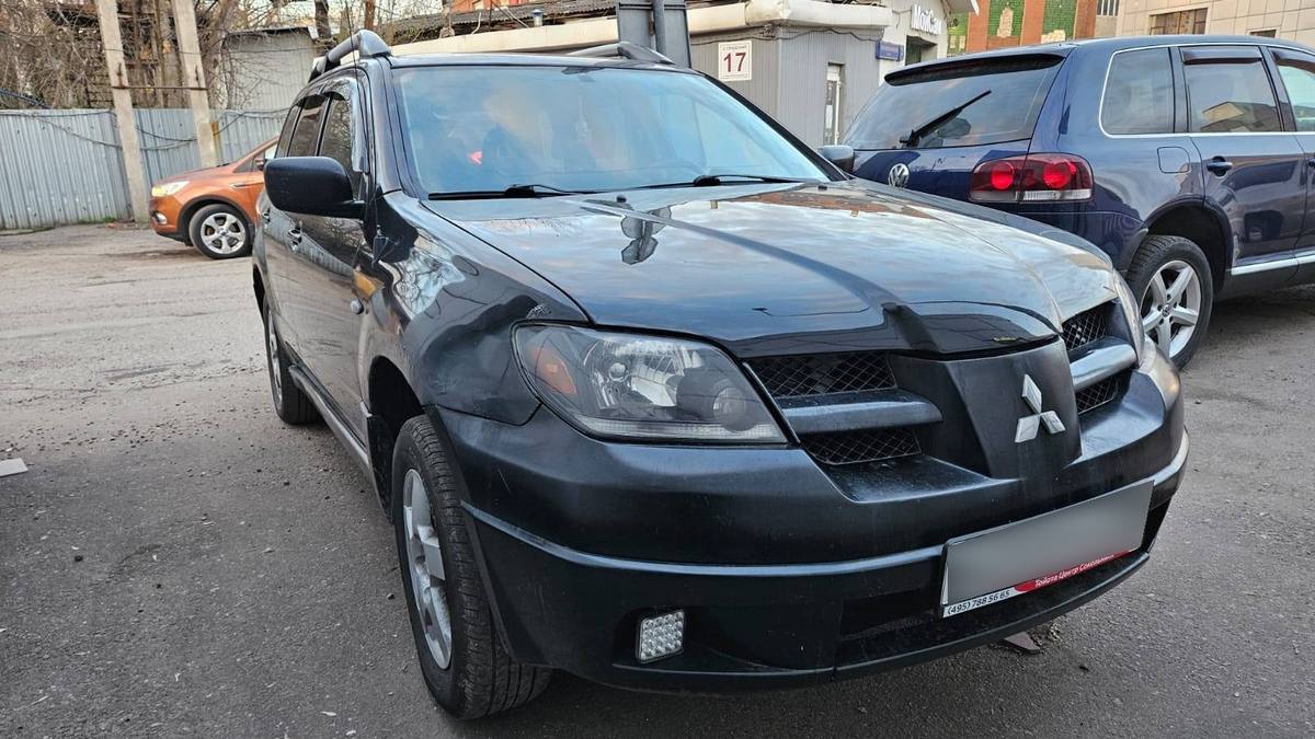 Купить Mitsubishi Outlander I внедорожник 5 дв., 2003 года, цвет: Черный, за  500000 руб. в Санкт-Петербурге